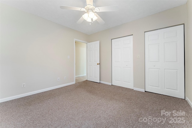 unfurnished bedroom featuring carpet flooring and ceiling fan