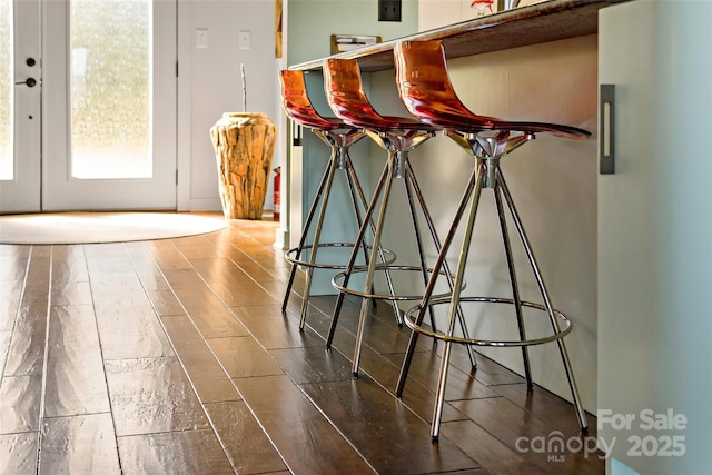 interior space featuring french doors and hardwood / wood-style floors