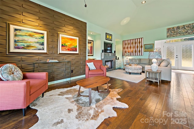 living room featuring dark wood-type flooring