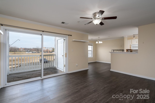 unfurnished living room featuring ornamental molding, dark hardwood / wood-style flooring, and ceiling fan with notable chandelier