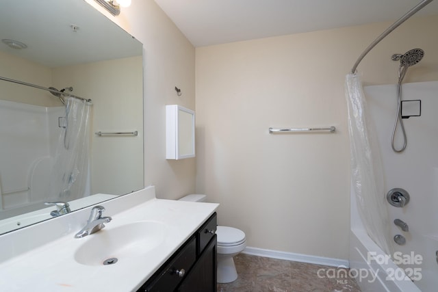 full bathroom featuring vanity, shower / bath combo, and toilet