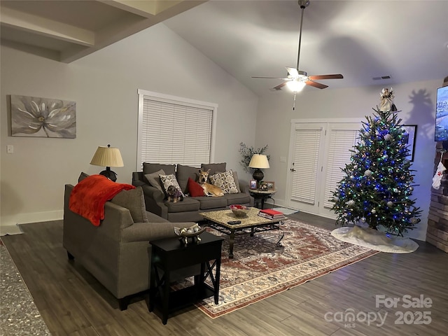 living room featuring ceiling fan, lofted ceiling, and dark hardwood / wood-style flooring