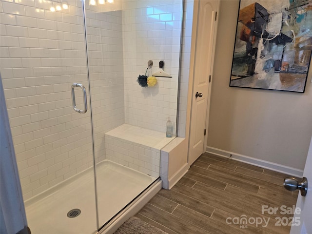 bathroom with an enclosed shower