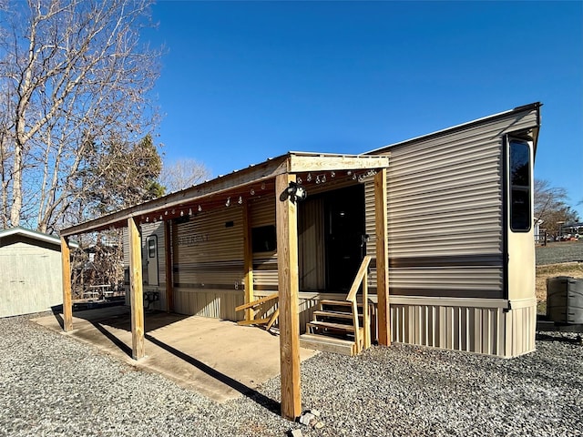 exterior space with a storage shed