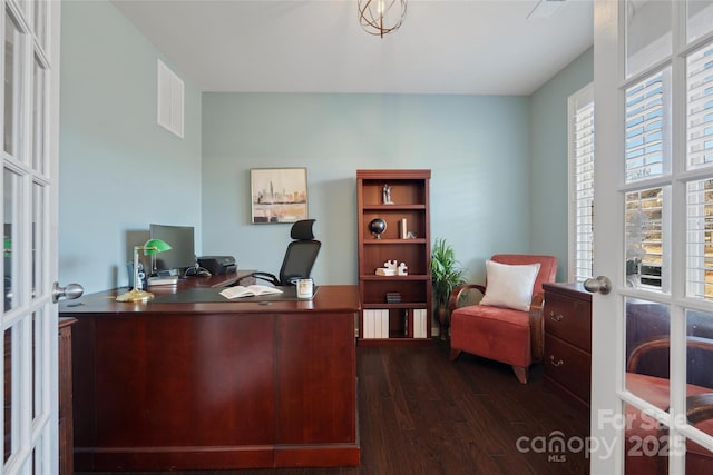 office space with dark hardwood / wood-style floors and french doors