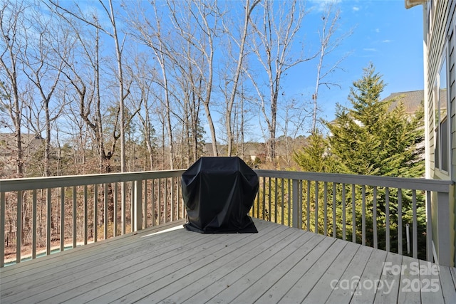 wooden deck with grilling area