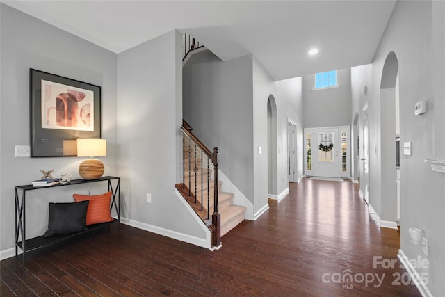 foyer with dark wood-type flooring