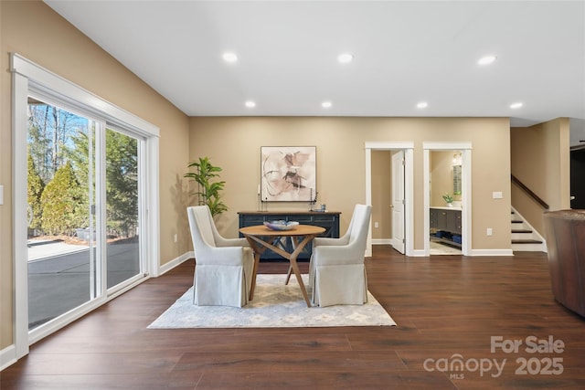 dining room with recessed lighting, stairs, and wood finished floors