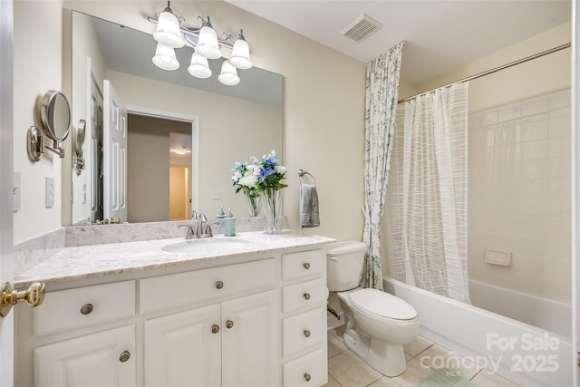 full bathroom with toilet, tile patterned flooring, vanity, and shower / tub combo with curtain