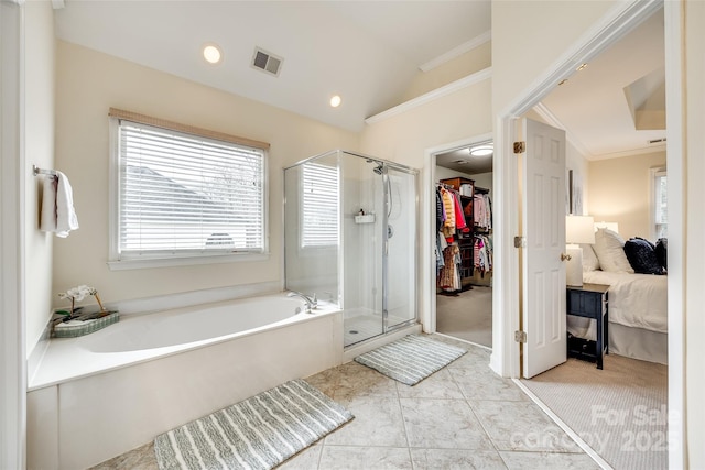 bathroom featuring tile patterned flooring, plus walk in shower, crown molding, and vaulted ceiling