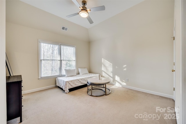 carpeted bedroom featuring ceiling fan and lofted ceiling