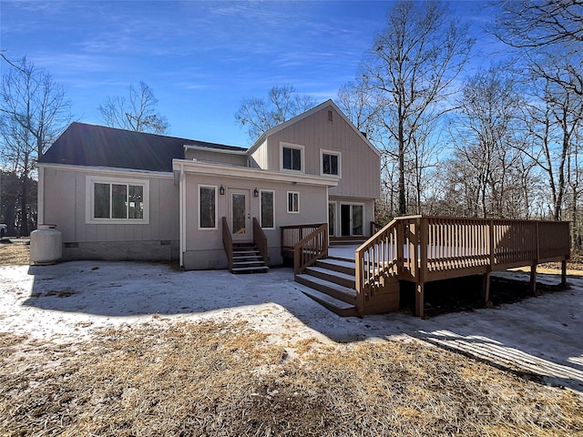 view of front facade featuring french doors and a deck