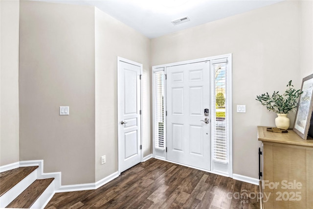 entryway featuring dark wood-type flooring