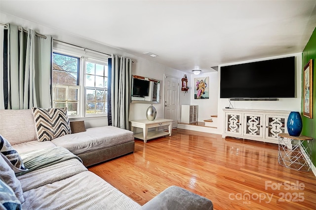 living room with hardwood / wood-style floors