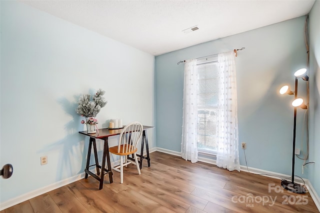 interior space with hardwood / wood-style flooring