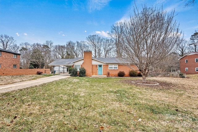 view of property exterior featuring a garage and a lawn