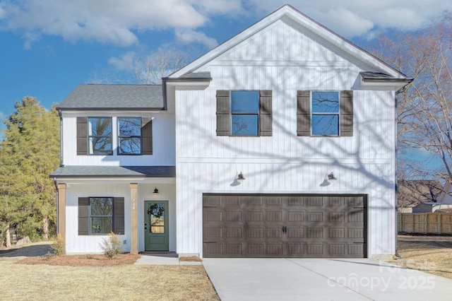 view of front of property with a garage