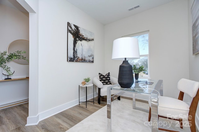 office space featuring hardwood / wood-style floors