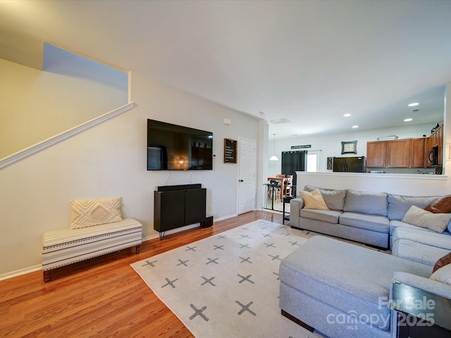 living room featuring light hardwood / wood-style flooring