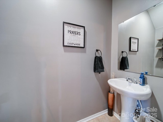 bathroom with tile patterned flooring