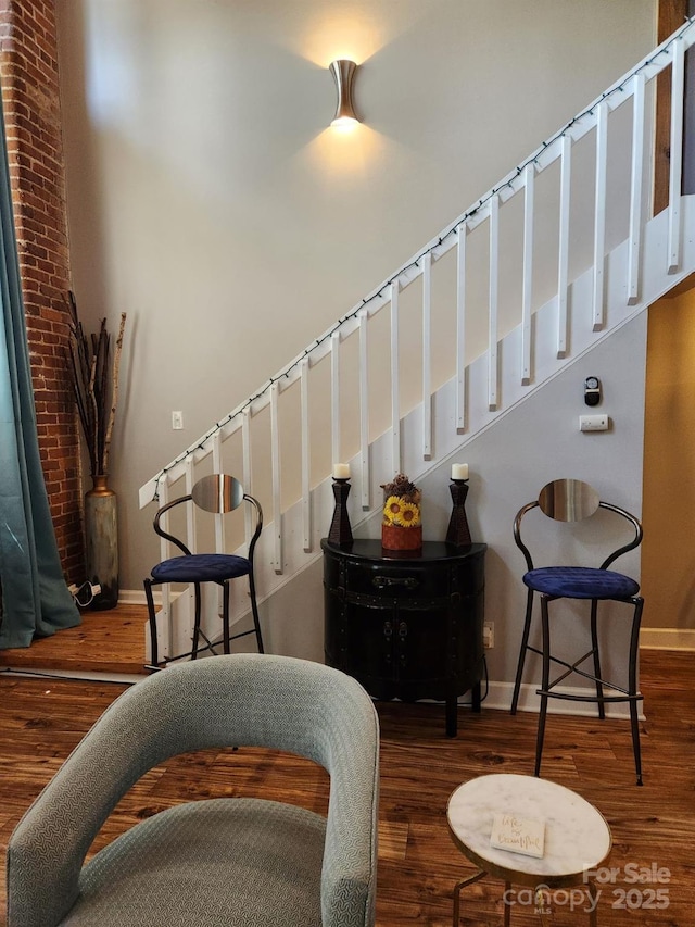 stairs featuring wood-type flooring