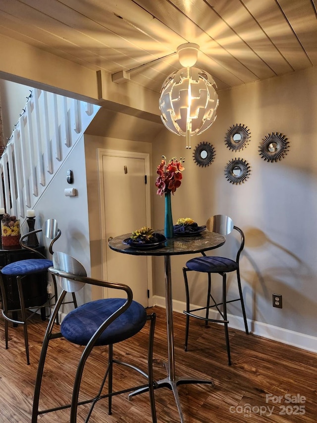 dining space featuring hardwood / wood-style floors