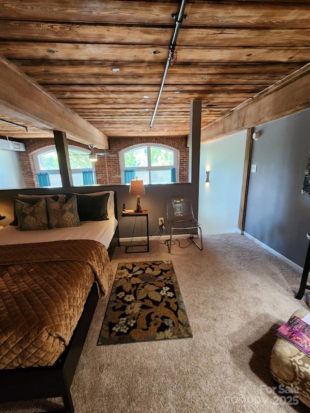 bedroom featuring brick wall, a wall mounted AC, carpet floors, and wooden ceiling