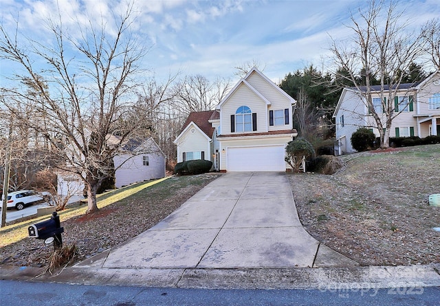 front of property with a garage