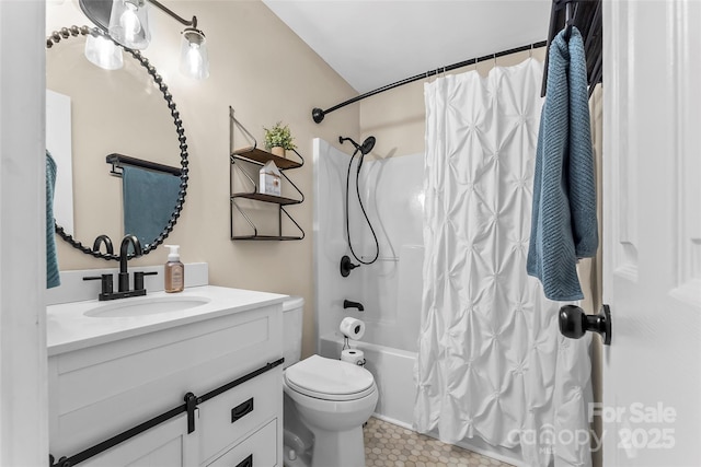 full bathroom featuring tile patterned flooring, vanity, shower / tub combo with curtain, and toilet