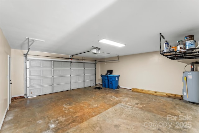 garage with a garage door opener and electric water heater