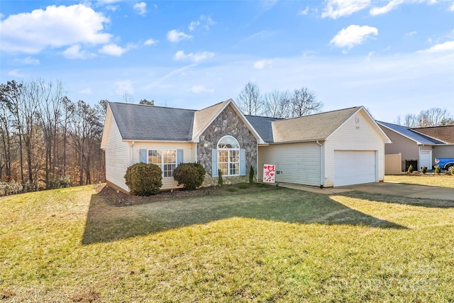 view of front of house featuring a garage and a front yard