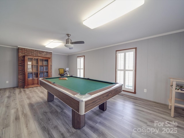 rec room with hardwood / wood-style floors, crown molding, and pool table