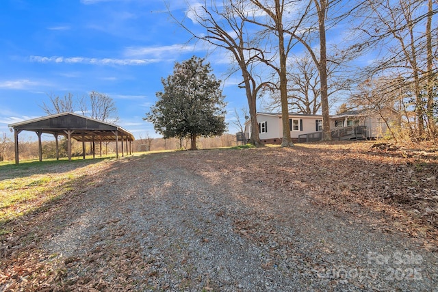 exterior space with a carport