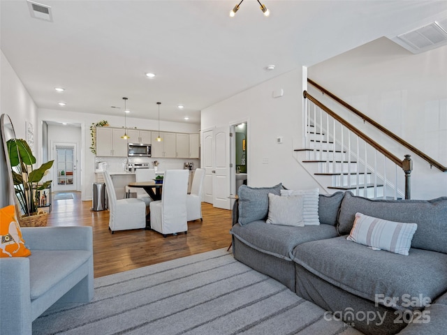 living room with hardwood / wood-style floors