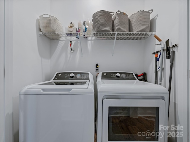 laundry area featuring independent washer and dryer