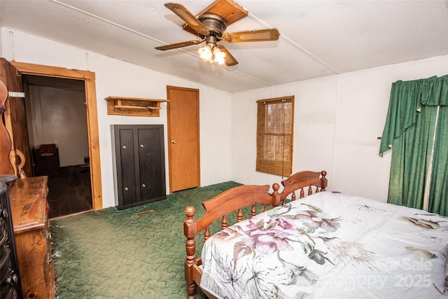 bedroom with ceiling fan and lofted ceiling