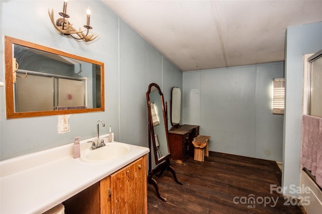 bathroom featuring vanity and wood-type flooring