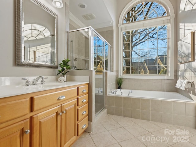 bathroom with vanity, tile patterned flooring, a shower with door, and crown molding