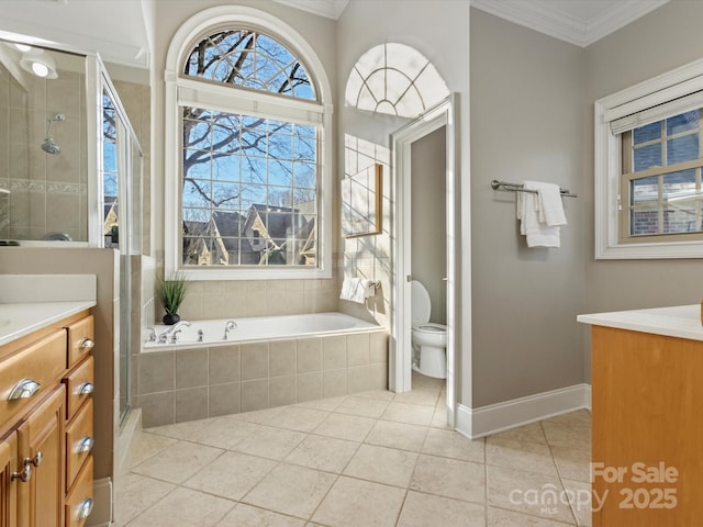 full bathroom featuring tile patterned flooring, vanity, toilet, ornamental molding, and separate shower and tub