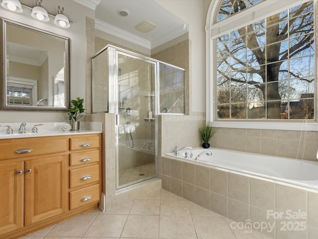 bathroom with vanity, tile patterned floors, plus walk in shower, and ornamental molding