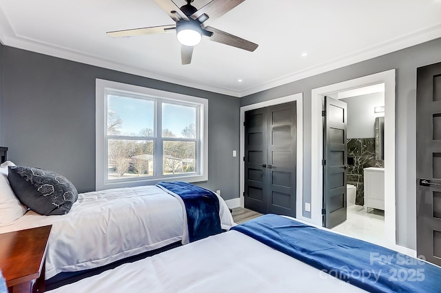 bedroom featuring ensuite bathroom, ceiling fan, light hardwood / wood-style floors, ornamental molding, and a closet