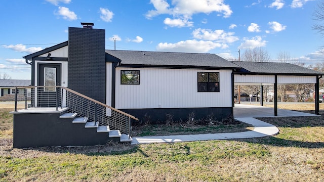 exterior space featuring a carport