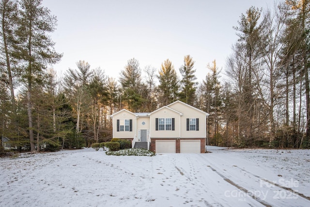 view of front of property with a garage