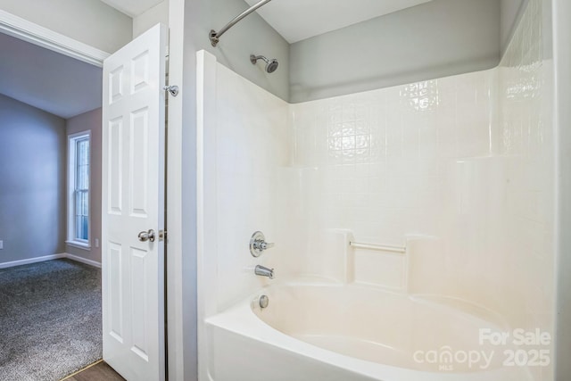 bathroom featuring washtub / shower combination