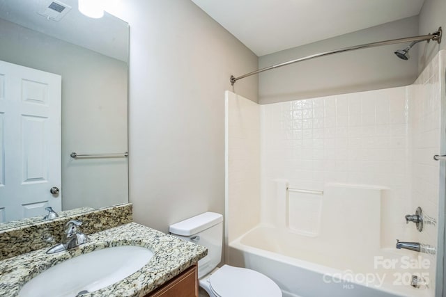 full bathroom with shower / bathing tub combination, vanity, and toilet