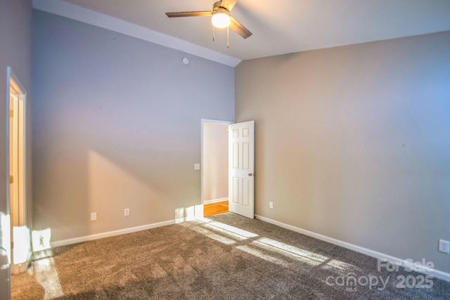 unfurnished room featuring high vaulted ceiling, carpet flooring, and ceiling fan