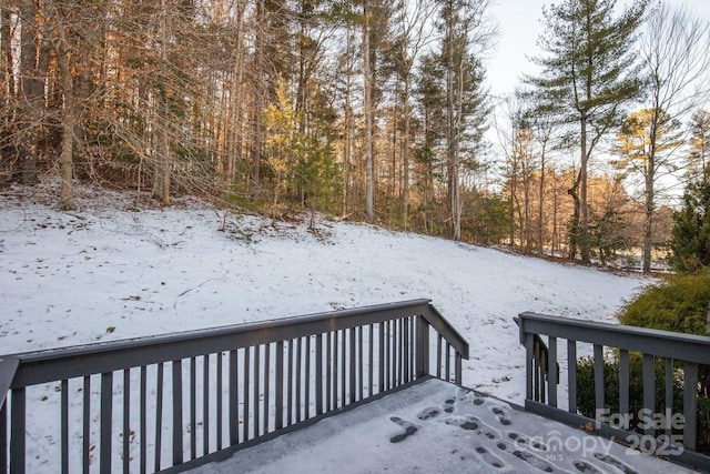 view of snow covered deck