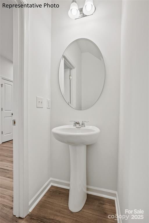 bathroom featuring hardwood / wood-style flooring