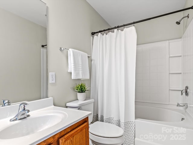 full bathroom with toilet, vanity, and shower / tub combo with curtain