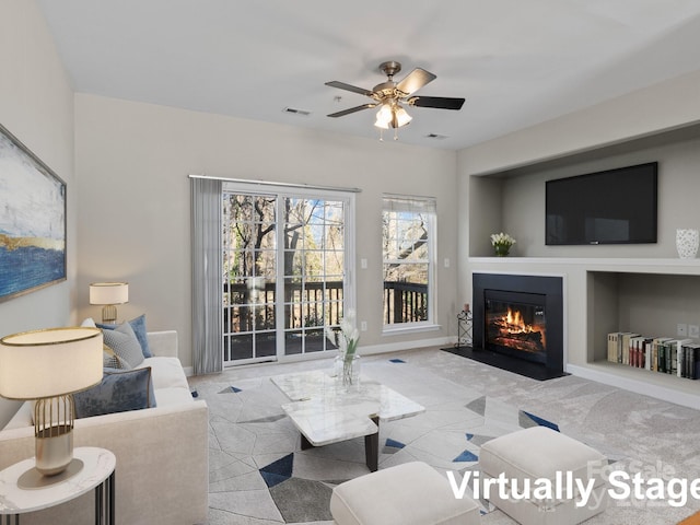 living room with ceiling fan